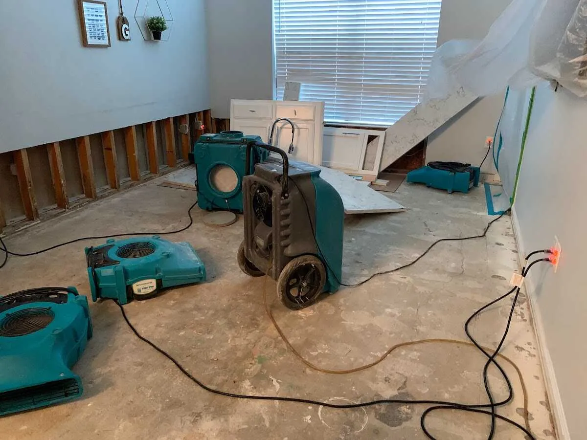 Dehumidifier in flood-cut room for Water Damage Restoration in Cibolo
